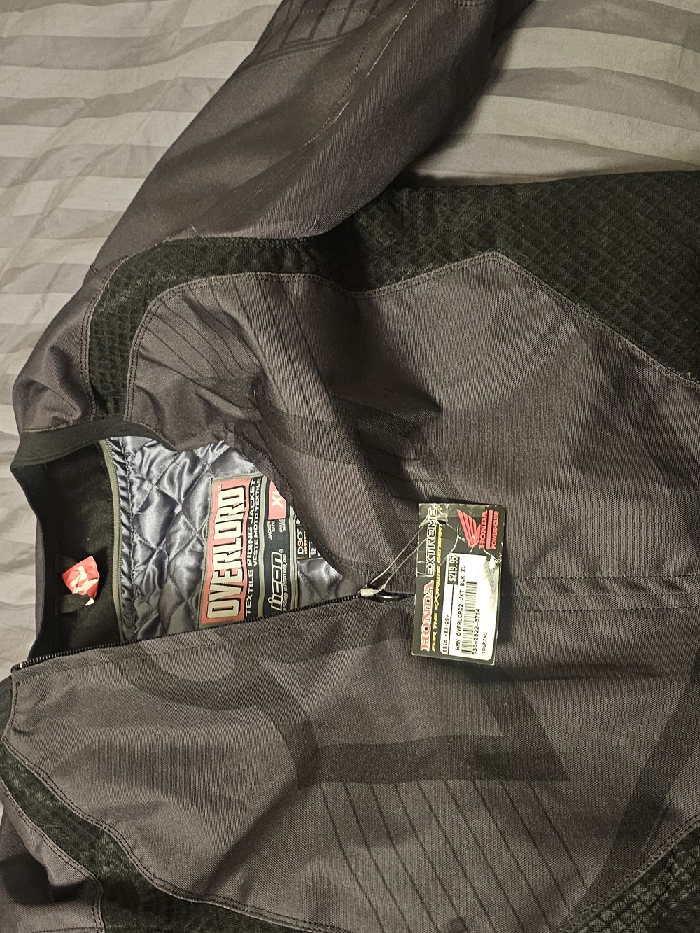 ICON Men's Black Bomber-Style Riding Jacket with Gray Accents